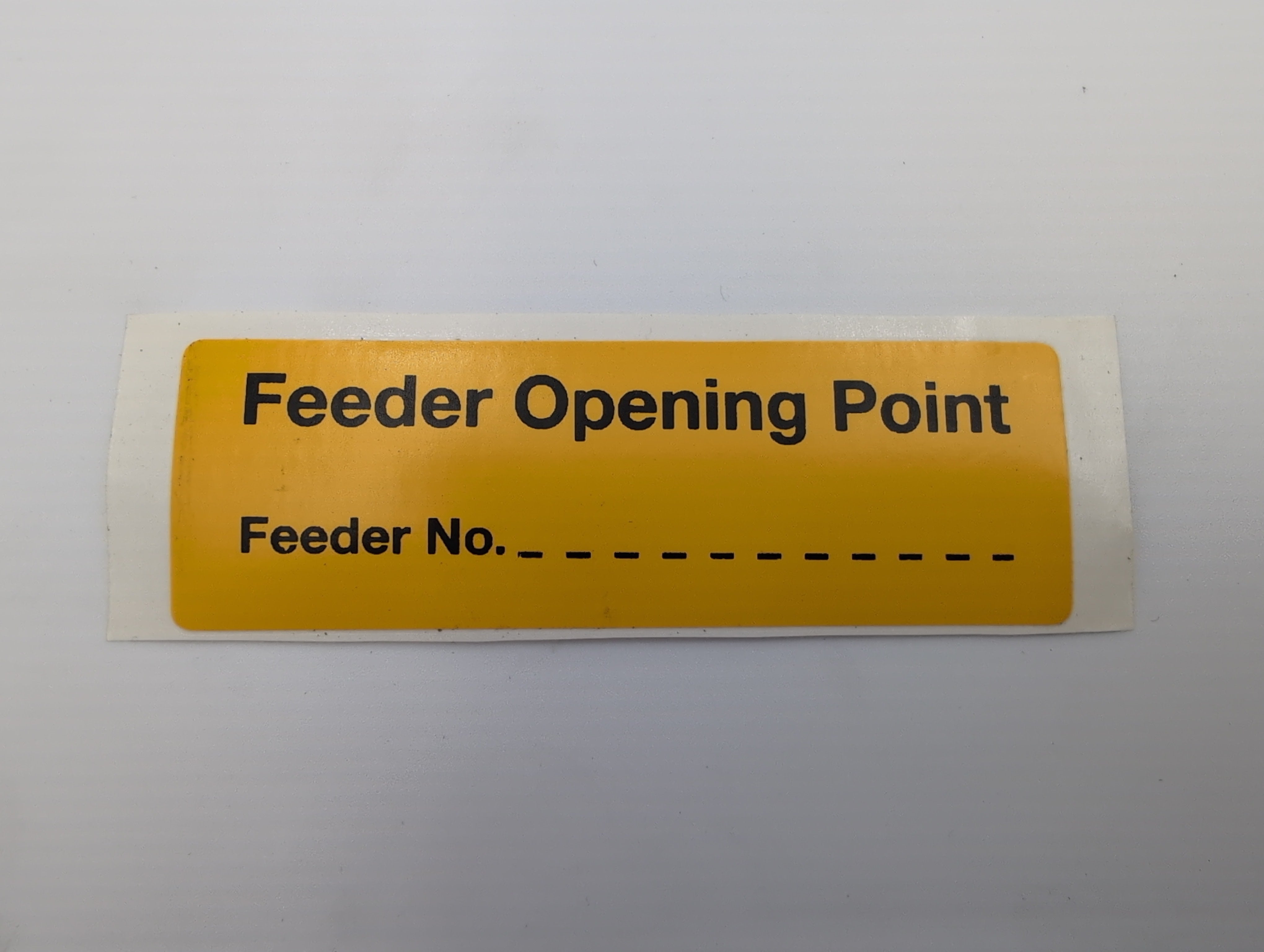 Feeder Opening Point 75x25 Label